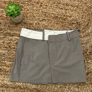 ASYMMETRICAL MINI SKIRT